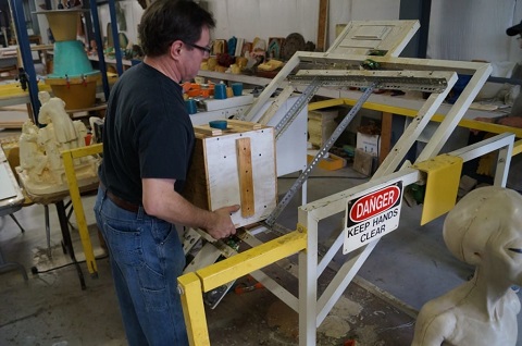 Place Mold Box on Rotational Casting Machine Place Mold Box on Rotational Casting Machine
