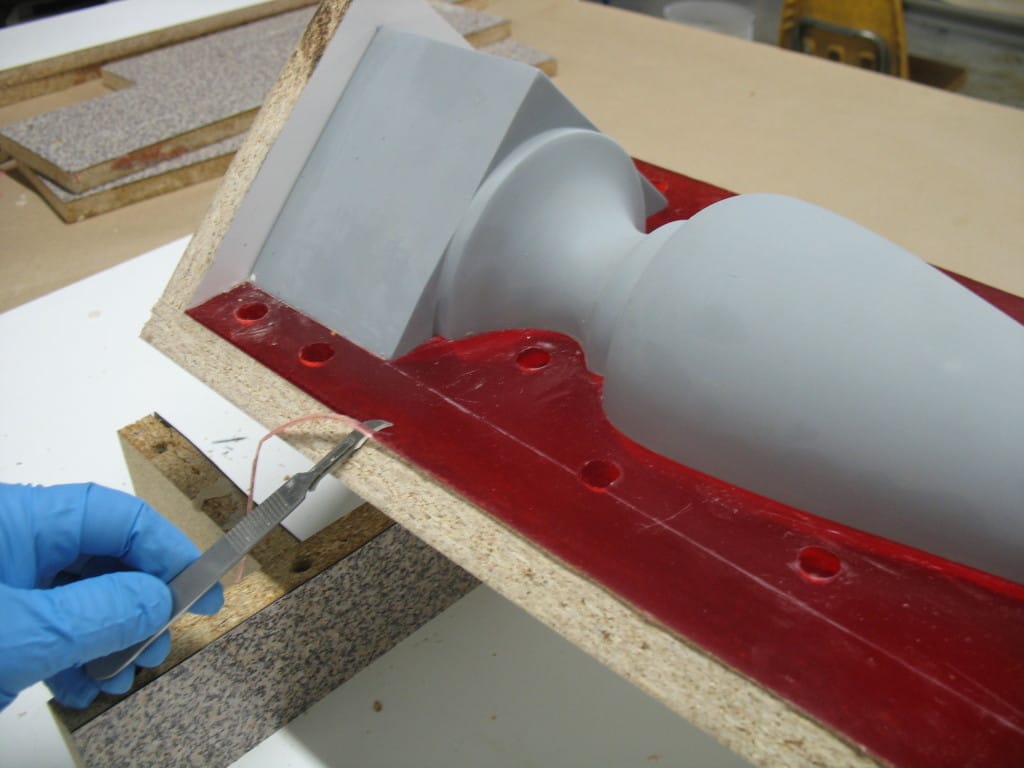 Trim Excess Rubber with Scalpel
