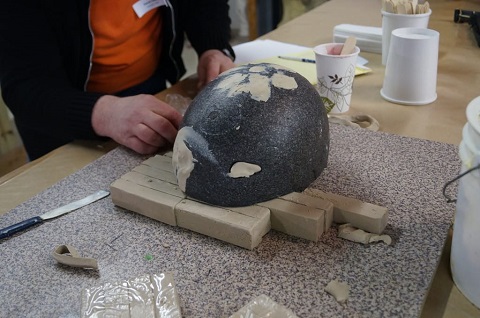 Clay Plugs Holes in Model Plugging Holes with Clay